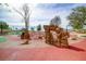 Community playground featuring stone climbing areas and fun obstacles for active outdoor play at 669 Assurance Pl, Henderson, NV 89011
