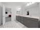 Main bathroom featuring a double vanity at 7058 W Camero Ave, Las Vegas, NV 89113