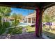 This gazebo covered backyard offers serene pool views with plenty of seating at 723 Seclusion Glen Ave, Las Vegas, NV 89123