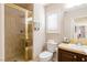 Bathroom featuring glass-door shower, and sink with tan counter at 723 Seclusion Glen Ave, Las Vegas, NV 89123