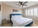 Comfortable bedroom with natural light, ceiling fan, and a serene atmosphere at 723 Seclusion Glen Ave, Las Vegas, NV 89123