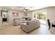 Bright living room with tile flooring, fireplace, and access to outdoor pool at 723 Seclusion Glen Ave, Las Vegas, NV 89123