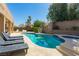 This backyard features a well maintained private pool with plenty of space for lounging at 723 Seclusion Glen Ave, Las Vegas, NV 89123