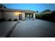 Long driveway with covered parking leading to the attached garage at 7451 Mystic Stream St, Las Vegas, NV 89131