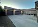 Attached three-car garage offering ample parking space and convenient access at 7451 Mystic Stream St, Las Vegas, NV 89131