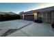 Attached three-car garage and large driveway, offering lots of parking space at 7451 Mystic Stream St, Las Vegas, NV 89131