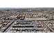 An aerial view captures the beautiful landscaping and residential architecture of the community at 7482 Lodano Ave, Las Vegas, NV 89113