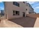 Spacious blank canvas backyard offers a fenced boundary, a sliding glass door to home, ready for your custom design at 7482 Lodano Ave, Las Vegas, NV 89113