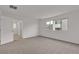 Bright bedroom with carpet, a window, and white walls, offering lots of natural light and an airy feel at 7482 Lodano Ave, Las Vegas, NV 89113