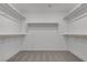 Spacious walk-in closet with ample shelving and rod space, providing plenty of storage at 7482 Lodano Ave, Las Vegas, NV 89113