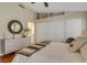 Bright bedroom features vaulted ceiling, large closet, and modern furnishings at 7608 Vista Hills Dr, Las Vegas, NV 89128