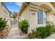 Charming single-story home featuring a well-maintained landscape and walkway at 7608 Vista Hills Dr, Las Vegas, NV 89128