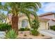 Charming single-story home featuring a well-maintained landscape and attached two-car garage at 7608 Vista Hills Dr, Las Vegas, NV 89128