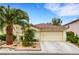 Charming single-story home featuring a well-maintained landscape and attached two-car garage at 7608 Vista Hills Dr, Las Vegas, NV 89128