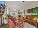 Inviting living room featuring an open concept layout with dining area at 7608 Vista Hills Dr, Las Vegas, NV 89128