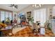Open-concept living space with abundant natural light, fireplace and comfortable seating at 7608 Vista Hills Dr, Las Vegas, NV 89128