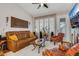 Comfortable living room with a vaulted ceiling and stone fireplace at 7608 Vista Hills Dr, Las Vegas, NV 89128