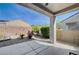 Enjoy the landscaped backyard from the covered patio, perfect for outdoor living at 7732 Songster St, North Las Vegas, NV 89084