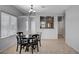Dining room with ample natural light and view to the kitchen for easy serving at 7732 Songster St, North Las Vegas, NV 89084