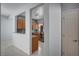Well-lit kitchen featuring stainless appliances, granite countertops, and warm wood cabinets at 7732 Songster St, North Las Vegas, NV 89084