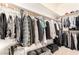 Spacious walk-in closet featuring ample storage with rods and shelving for organized clothing and luggage at 7900 Riviera Beach Dr, Las Vegas, NV 89128