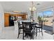 Bright kitchen with oak cabinets, white counters and modern appliances, perfect for Gathering meals at 7954 Kentshire Dr, Las Vegas, NV 89117
