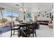 Spacious living room with fireplace, entertainment center and adjacent dining area perfect for Gathering gatherings at 7954 Kentshire Dr, Las Vegas, NV 89117