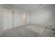 Bright bedroom with neutral carpeting, and a door leading to the ensuite bathroom at 80 Brixton Ave, Henderson, NV 89011