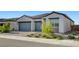 Charming single-story home featuring a two-car garage and drought-tolerant landscaping at 80 Brixton Ave, Henderson, NV 89011