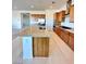 Spacious kitchen with a large island, stainless steel appliances, and granite countertops at 80 Brixton Ave, Henderson, NV 89011