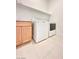 Functional laundry room with sink, cabinets, washer, and dryer at 80 Brixton Ave, Henderson, NV 89011
