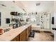 Bright bathroom with dual sinks, a vanity with drawers, and a glass-enclosed shower at 8084 Celina Hills St, Las Vegas, NV 89131