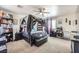 Comfortable primary bedroom with a ceiling fan, neutral carpet, and ample space at 8084 Celina Hills St, Las Vegas, NV 89131