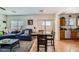 Inviting living room and dining area with tile flooring and ample natural light at 8084 Celina Hills St, Las Vegas, NV 89131