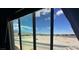 A scenic view from the window captures the expansive desert landscape and the vibrant blue sky at 8084 Celina Hills St, Las Vegas, NV 89131