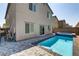 A clear view of the backyard swimming pool with spa at 8351 Gold River Ct, Las Vegas, NV 89113