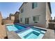 Backyard view showcasing the pool, spa and patio area perfect for entertaining at 8351 Gold River Ct, Las Vegas, NV 89113