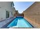 Backyard with a swimming pool and well-maintained surrounding at 8351 Gold River Ct, Las Vegas, NV 89113