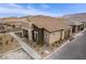 View of the home with desert landscaping and hardscape with mountain views at 892 Elmwood Forest Ln, Las Vegas, NV 89138