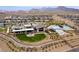 Aerial view of the community pool, spa, and recreation lawn at 892 Elmwood Forest Ln, Las Vegas, NV 89138