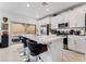 Modern kitchen featuring a large island, stainless steel appliances, and ample cabinet space at 892 Elmwood Forest Ln, Las Vegas, NV 89138