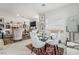 Open living space featuring modern decor and a seamless flow between living and dining areas at 892 Elmwood Forest Ln, Las Vegas, NV 89138