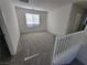 Upstairs loft area with plush carpeting and ample natural light at 9159 Oxford Blue Ave, Las Vegas, NV 89148