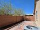 Backyard with a concrete patio and privacy wall at 9463 Jumping Frog Ct, Las Vegas, NV 89147
