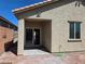 Backyard with a covered patio, sliding glass doors, and hose at 9463 Jumping Frog Ct, Las Vegas, NV 89147
