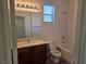 Bathroom featuring a single vanity, tub-shower, and modern lighting at 9463 Jumping Frog Ct, Las Vegas, NV 89147