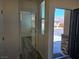 Bright entryway with wood-look floors and views of the home's exterior at 9463 Jumping Frog Ct, Las Vegas, NV 89147