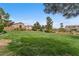 Common green space among homes in a beautiful community at 9737 Darlington Ct, Las Vegas, NV 89149
