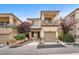 Inviting two-story townhome with a one car garage and charming balcony at 9737 Darlington Ct, Las Vegas, NV 89149