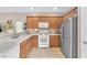 Kitchen with stainless steel refrigerator at 9737 Darlington Ct, Las Vegas, NV 89149